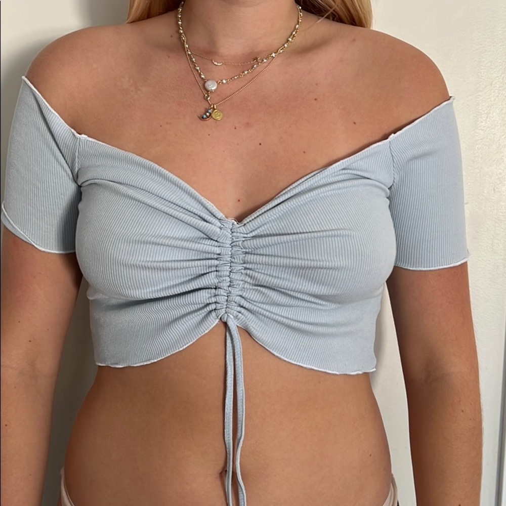 Callipygian Blue Top